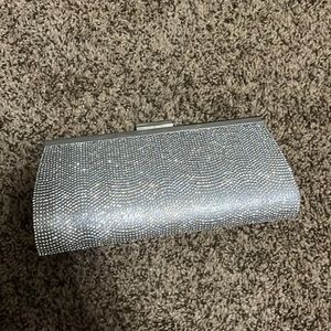 Large silver clutch with chain strap